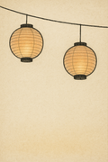 Two Japanese paper lanterns glowing amber, hung from a cord on warm off-white paper