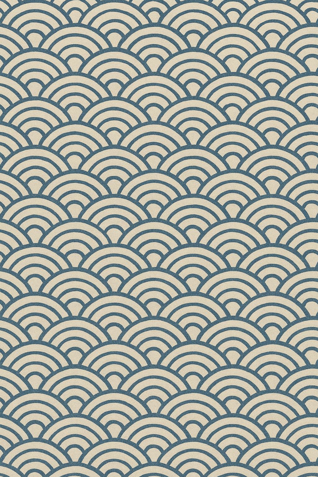 Seigaiha wave-scallop pattern in muted indigo on warm off-white paper